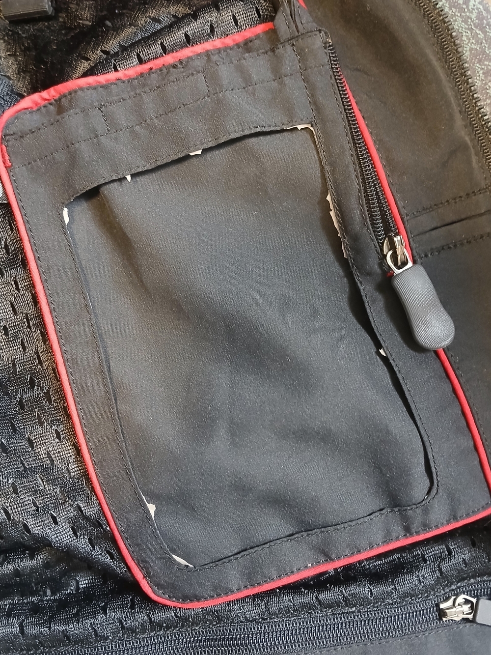 black SCOTTeVEST utility travel vest featuring a full-zip front READ - Picture 9 of 10